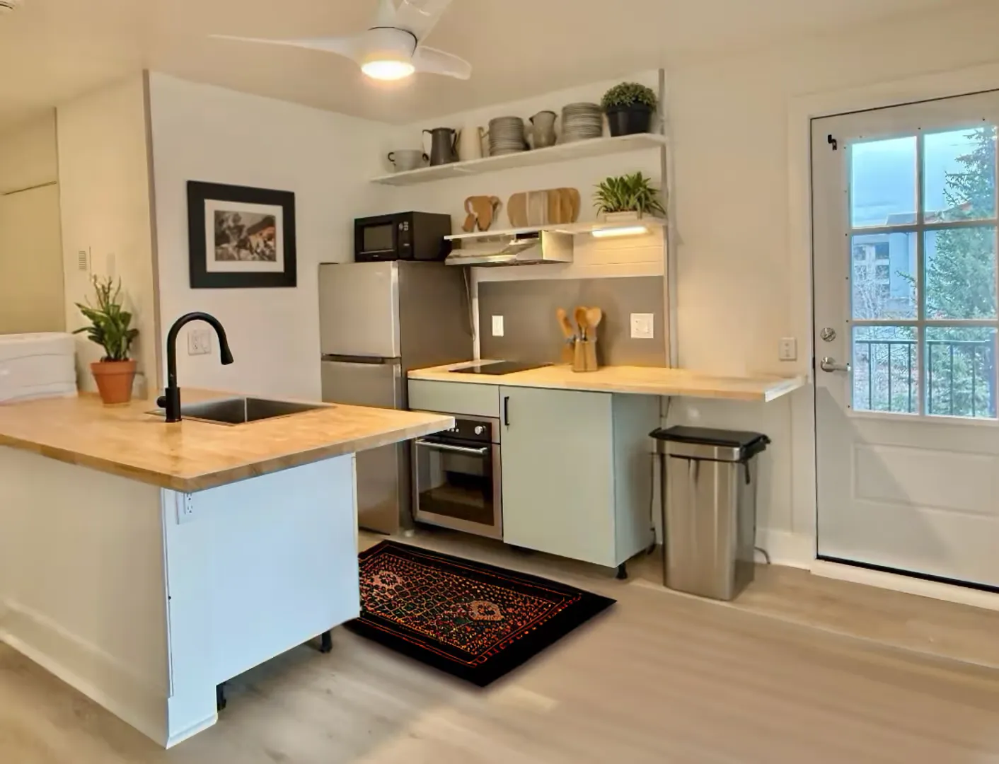 One Bedroom Corner Apartment with Deck and Washer & Dryer - Move-in Ready, Minutes from Downtown! All Utilities & Internet included. 
